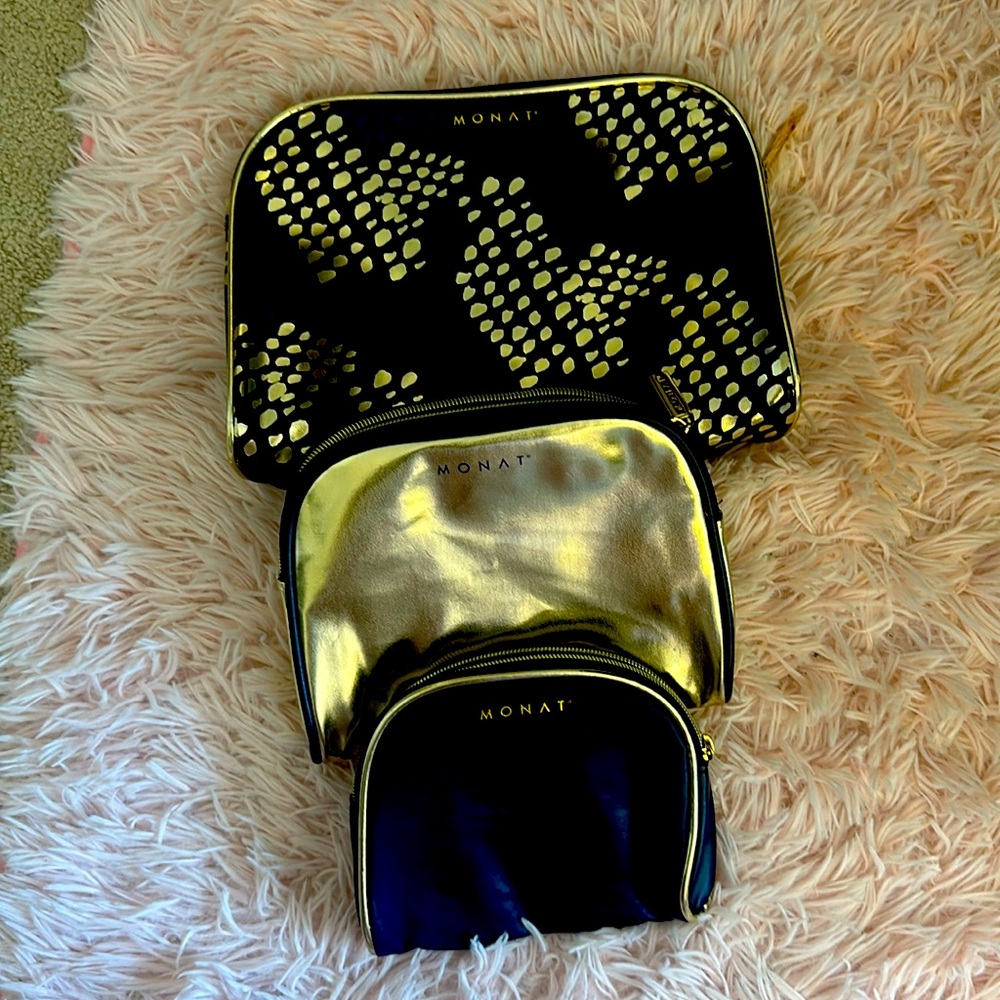 Triple cosmetics bags set. Purple w/gold leopard spots.  Great condition